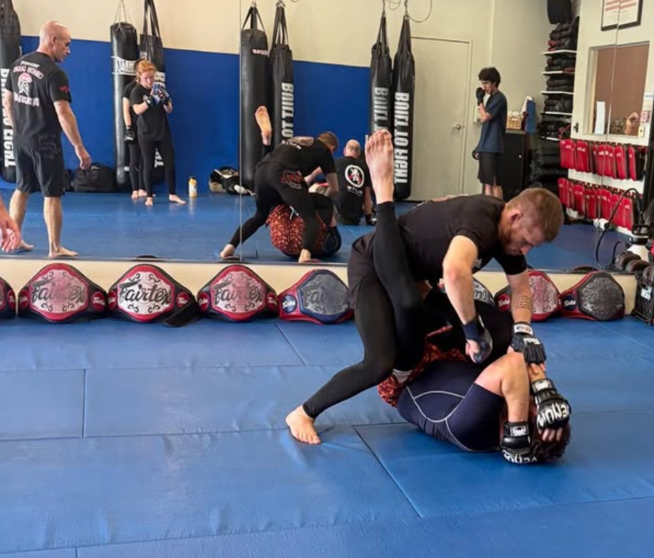 jiu-jitsu grappling move in MMA gym